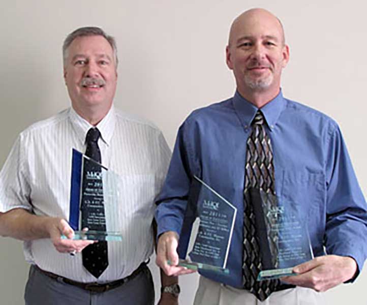 Wagman employees receive awards from MDQI