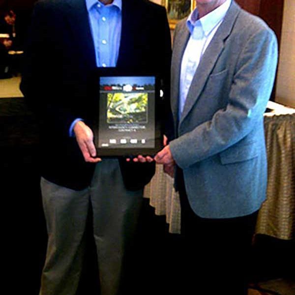 Mike Glezer and Todd Becker accept the ENR award