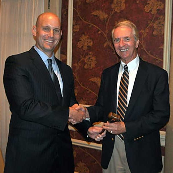 Rich Wagman passes the gavel to Mike Glezer