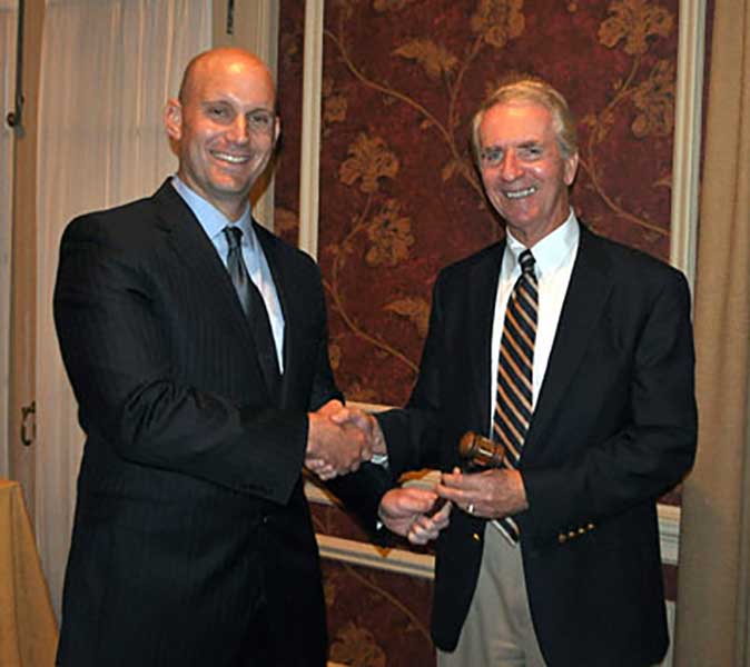 Rich Wagman passes the gavel to Mike Glezer