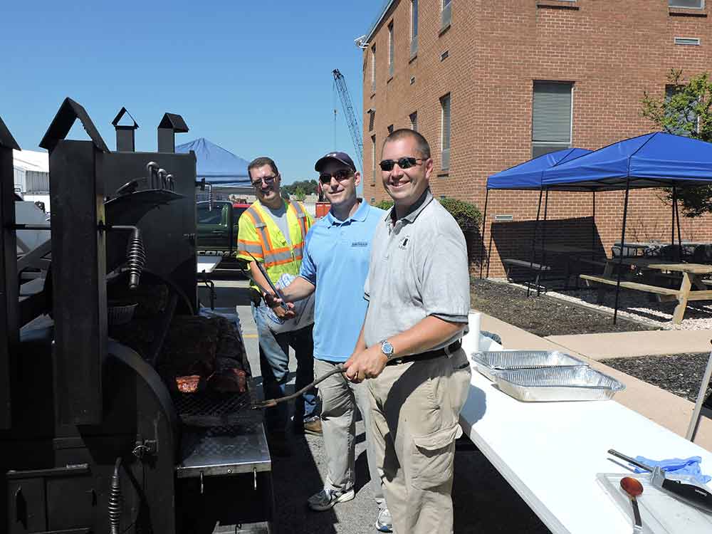 Mike Glezer grilling at Fifteen-Year Safety Milestone event