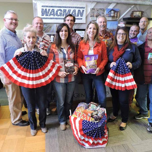 The Wagman Corporate Team makes a donation to SOAR