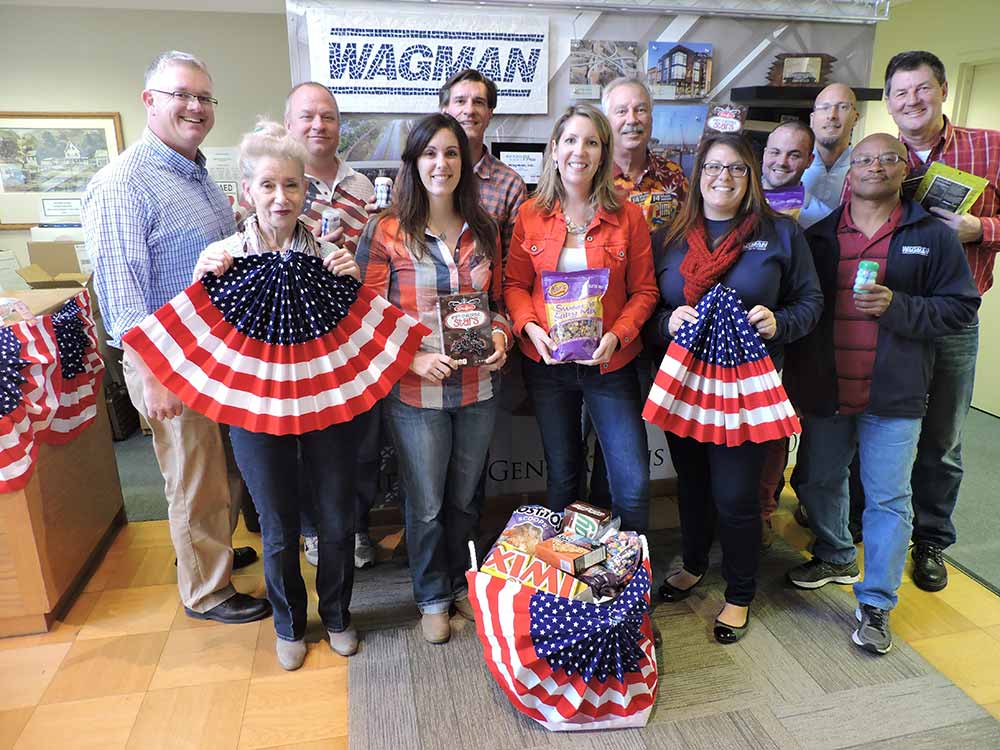 The Wagman Corporate Team makes a donation to SOAR